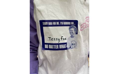 t shirt with a "running for Terry Fox" sticker on it