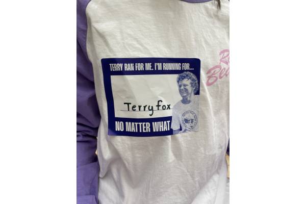 t shirt with a "running for Terry Fox" sticker on it